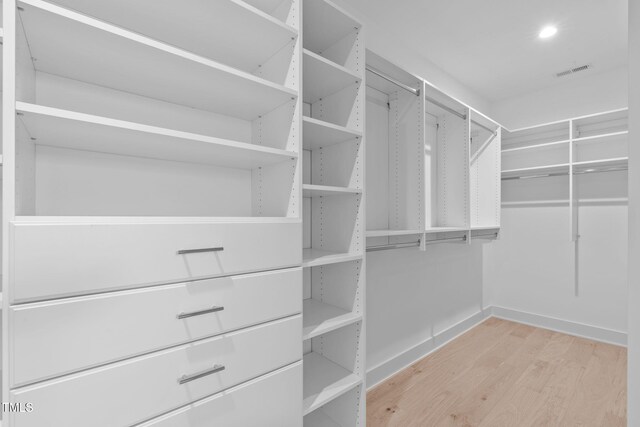 1435 Duplin Rd, Raleigh, NC 27607 - spacious closet featuring light wood finished floors