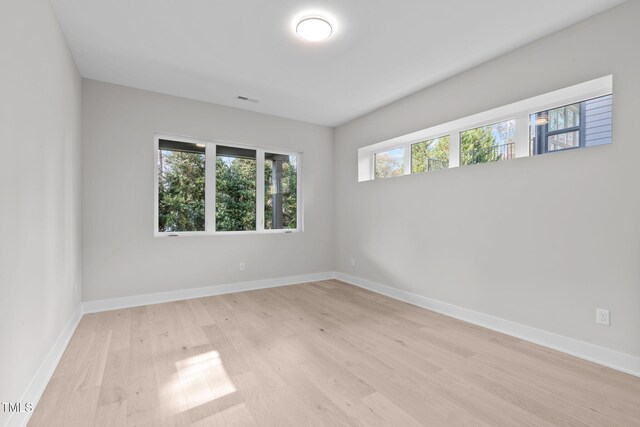 1435 Duplin Rd, Raleigh, NC 27607 - unfurnished room featuring light wood-type flooring and baseboards