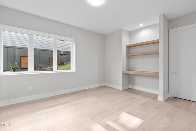 1435 Duplin Rd, Raleigh, NC 27607 - unfurnished bedroom featuring light wood-style floors, baseboards, and recessed lighting