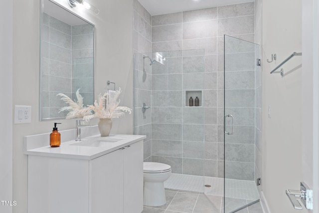 1435 Duplin Rd, Raleigh, NC 27607 - bathroom featuring toilet, a stall shower, and vanity