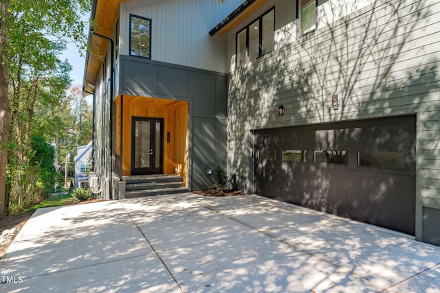 1435 Duplin Rd, Raleigh, NC 27607 - view of exterior entry with a garage