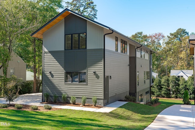 1435 Duplin Rd, Raleigh, NC 27607 - view of side of home featuring a lawn