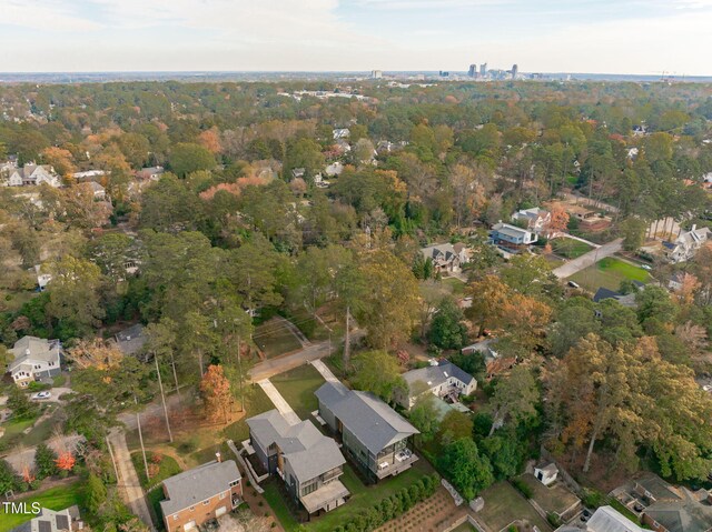 1435 Duplin Rd, Raleigh, NC 27607 - aerial view of property and surrounding area with nearby suburban area