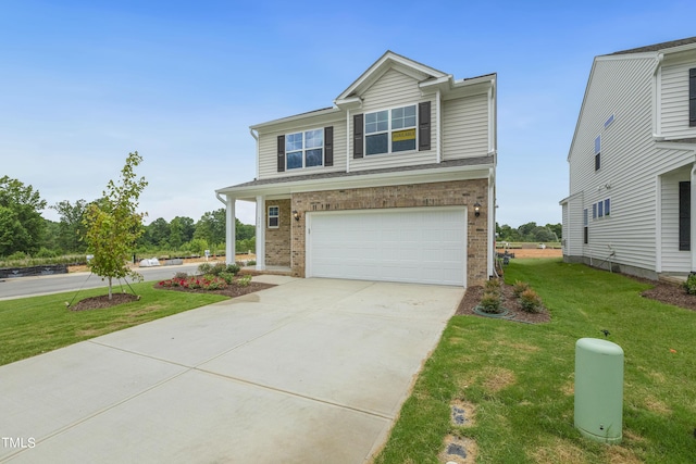 view of front facade featuring a front yard and a garage