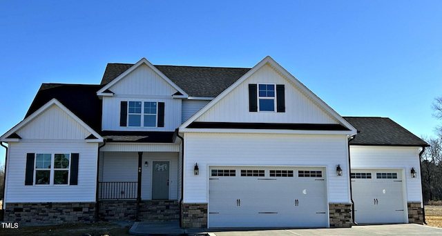 craftsman house featuring a garage and covered porch