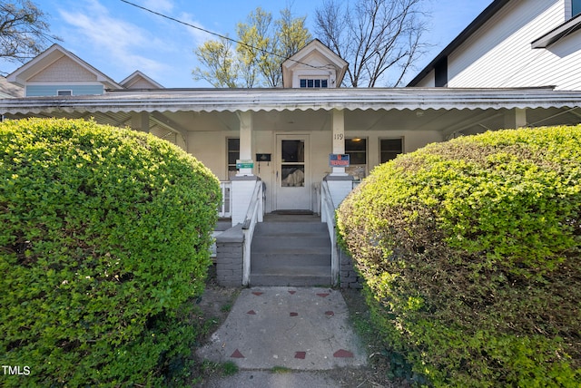 doorway to property featuring a porch