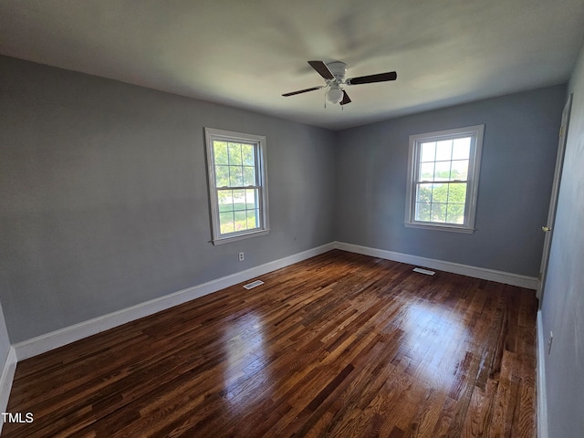 910 Marshall St, Roanoke Rapids, NC 27870 - unfurnished room featuring ceiling fan and dark hardwood / wood-style floors