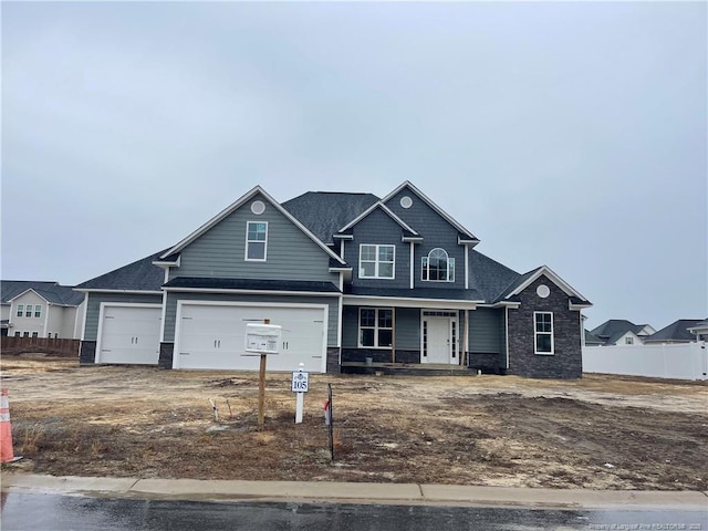 craftsman-style home with a garage