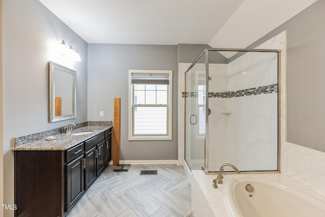 bathroom with separate shower and tub and large vanity