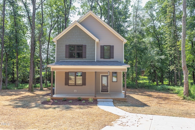 view of property featuring a porch