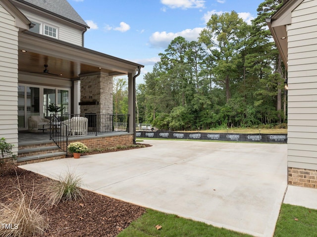 view of patio / terrace featuring ceiling fan