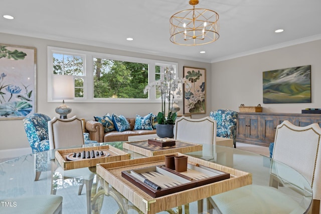 dining space with ornamental molding and a notable chandelier