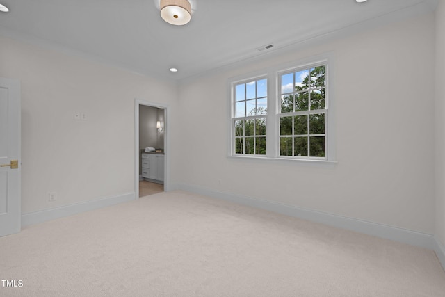 unfurnished bedroom featuring light carpet