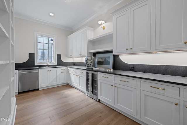 kitchen with white cabinetry, wine cooler, dishwasher, crown molding, and light hardwood / wood-style flooring