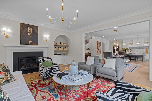 living room with ornamental molding and wood-type flooring