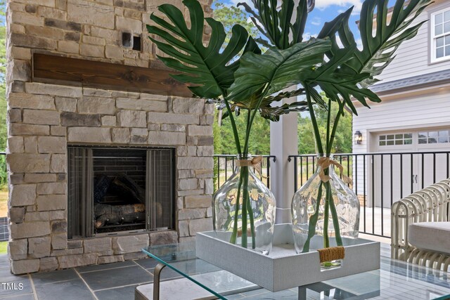 exterior space featuring an outdoor stone fireplace