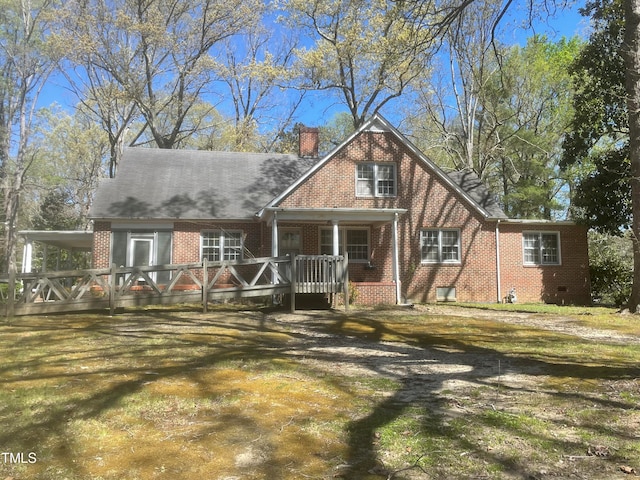 view of front of property with a front yard and covered porch