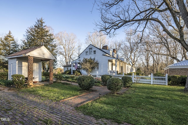 6720 Mebane Oaks Rd, Mebane, NC 27302 - view of property exterior featuring fence, a chimney, and a yard