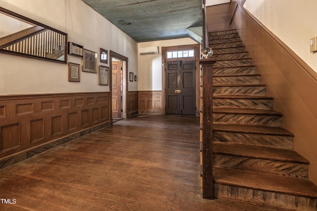 6720 Mebane Oaks Rd, Mebane, NC 27302 - entrance foyer with a wainscoted wall, a wall mounted AC, dark wood finished floors, and stairs