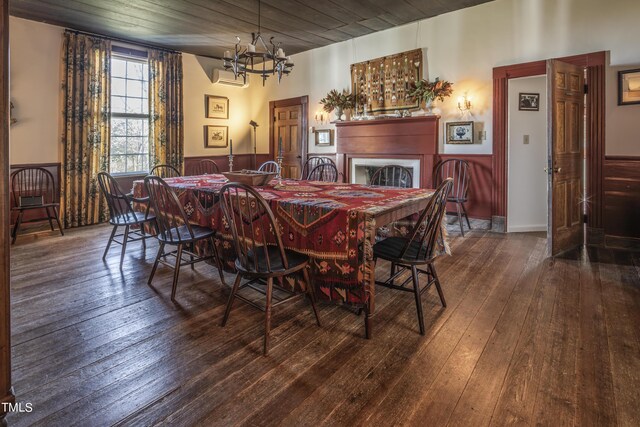 6720 Mebane Oaks Rd, Mebane, NC 27302 - dining space with a wall mounted AC, a chandelier, a wainscoted wall, wood ceiling, and hardwood / wood-style flooring