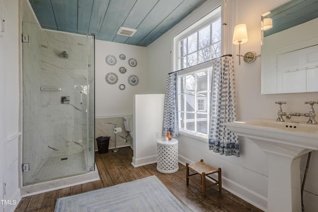 6720 Mebane Oaks Rd, Mebane, NC 27302 - bathroom with hardwood / wood-style floors, a shower stall, a wealth of natural light, and visible vents