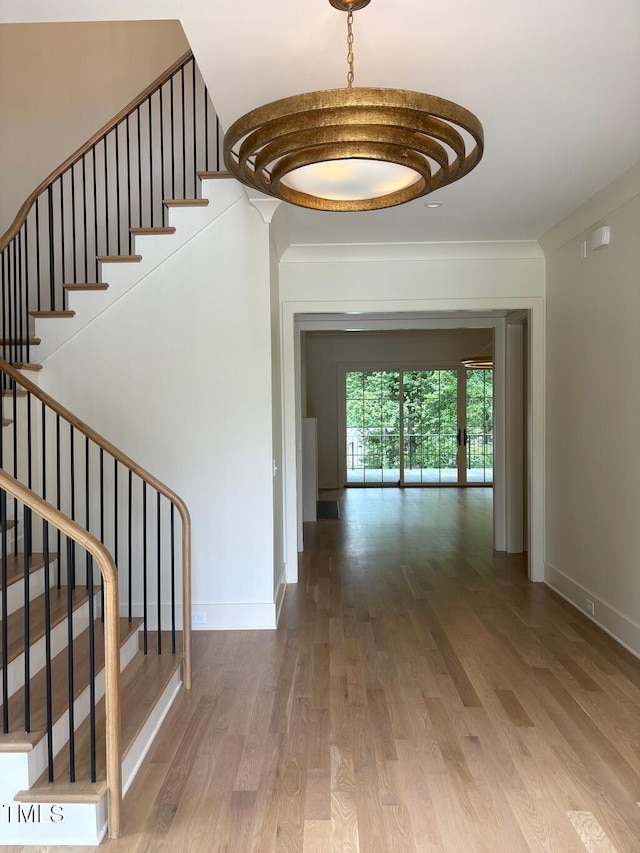 2227 Wheeler Rd, Raleigh, NC 27607 - stairway with wood finished floors and baseboards