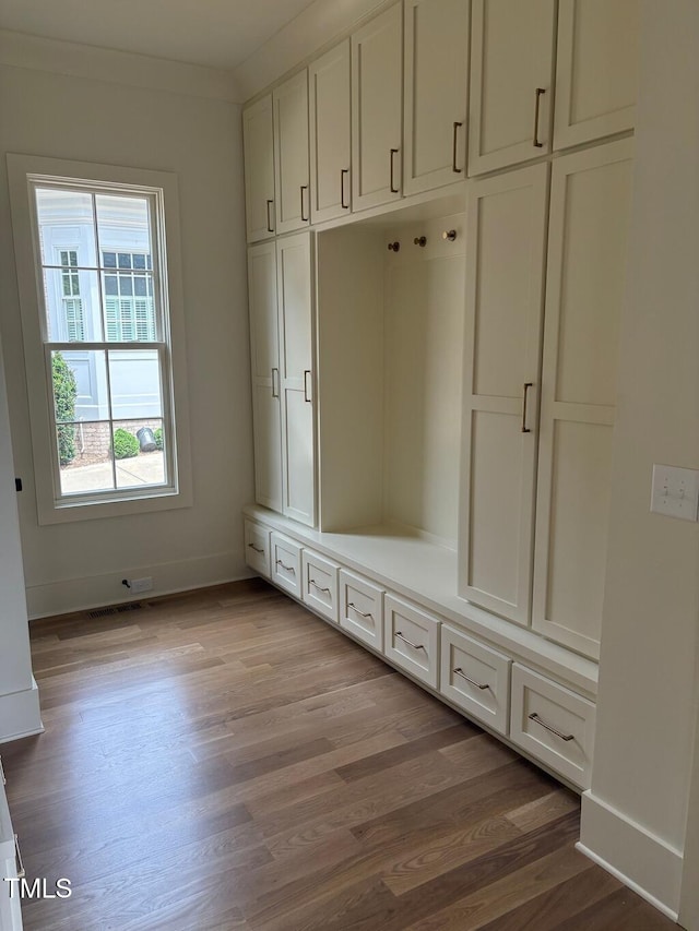 2227 Wheeler Rd, Raleigh, NC 27607 - mudroom featuring baseboards and wood finished floors