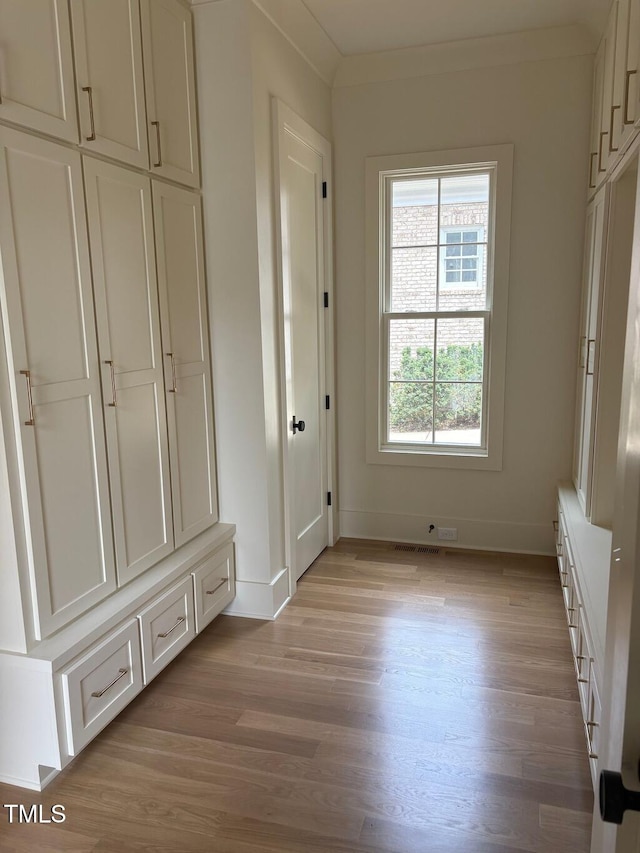 2227 Wheeler Rd, Raleigh, NC 27607 - mudroom featuring light wood-type flooring and baseboards