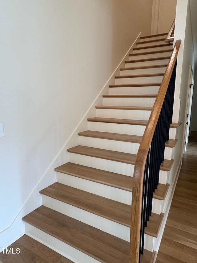 2227 Wheeler Rd, Raleigh, NC 27607 - staircase featuring wood finished floors