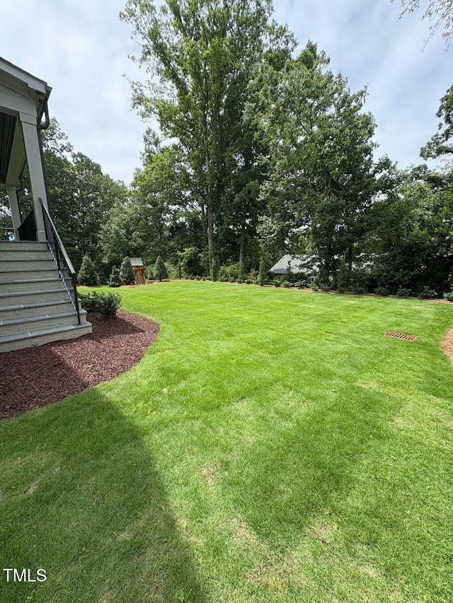 2227 Wheeler Rd, Raleigh, NC 27607 - view of grassy yard with stairway