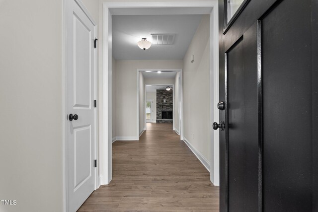 hall featuring hardwood / wood-style flooring