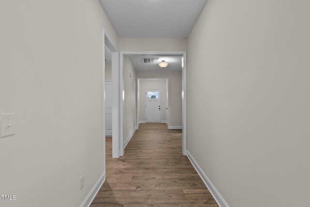 hall featuring hardwood / wood-style floors