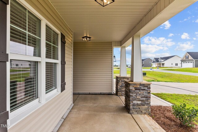 view of patio featuring covered porch