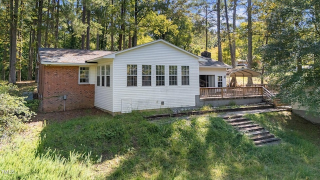 exterior space featuring a wooden deck