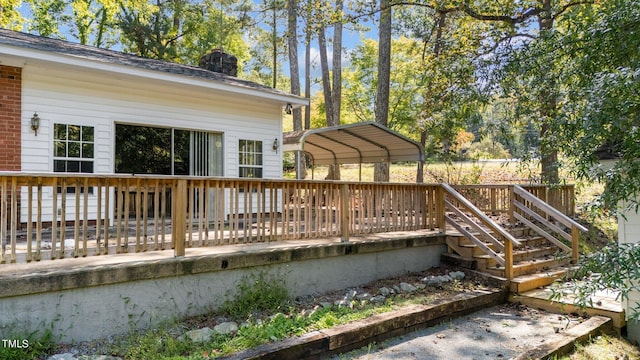 wooden deck with a carport