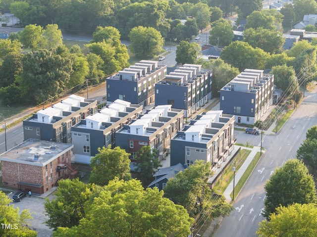 birds eye view of property with a residential view