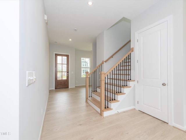 entrance foyer featuring light hardwood / wood-style floors