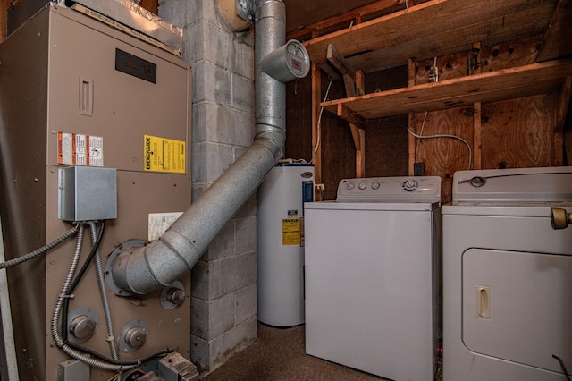 laundry room featuring water heater, independent washer and dryer, and heating utilities