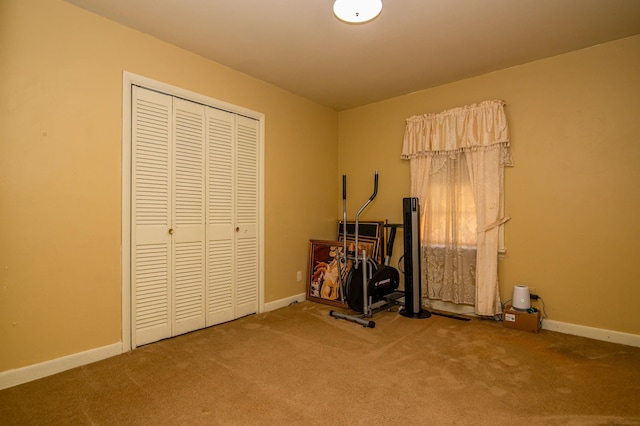 unfurnished bedroom with a closet and carpet floors