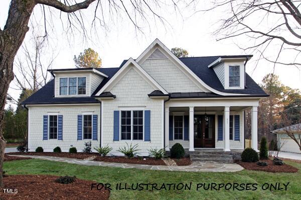 view of front of home with a porch and a garage