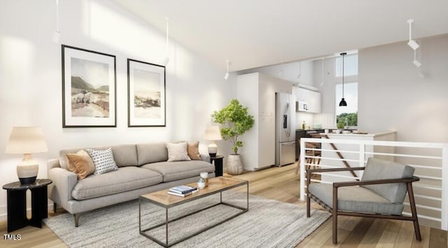 living room with light hardwood / wood-style floors