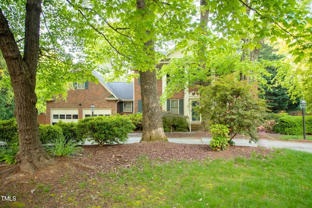 view of front of home featuring brick siding