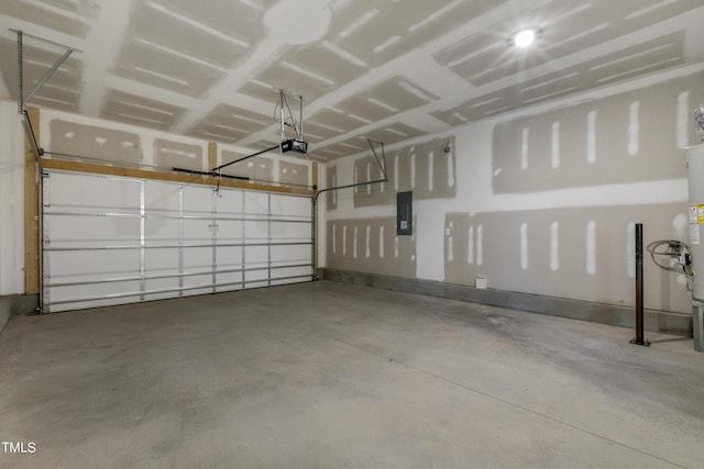 garage featuring electric panel and a garage door opener