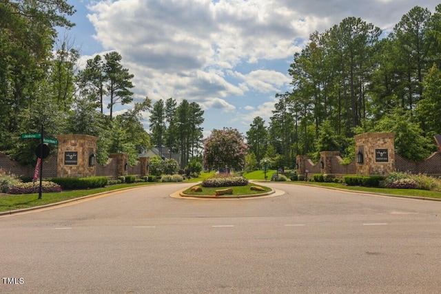 view of road featuring curbs