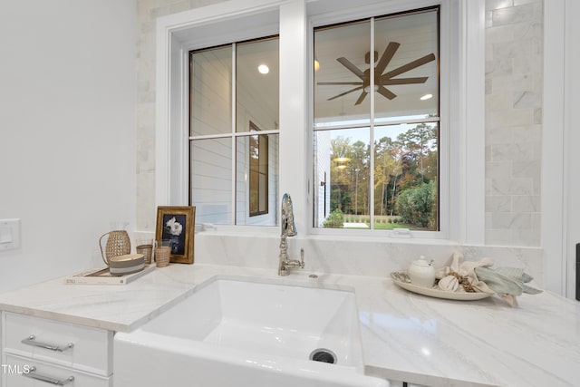 bathroom featuring vanity and ceiling fan