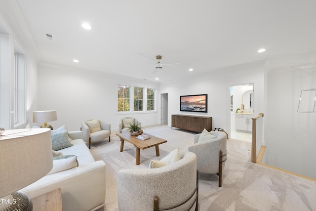 living room featuring light carpet and ornamental molding