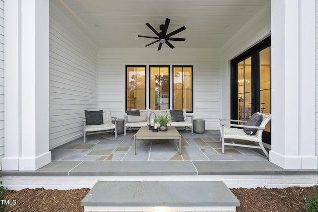 view of patio featuring ceiling fan