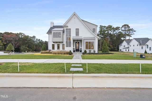 view of front of property with a front yard