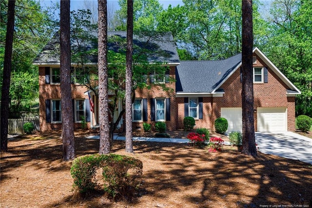 colonial inspired home with a garage