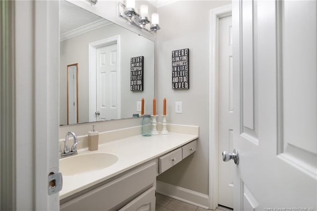 bathroom featuring vanity, crown molding, and tile flooring